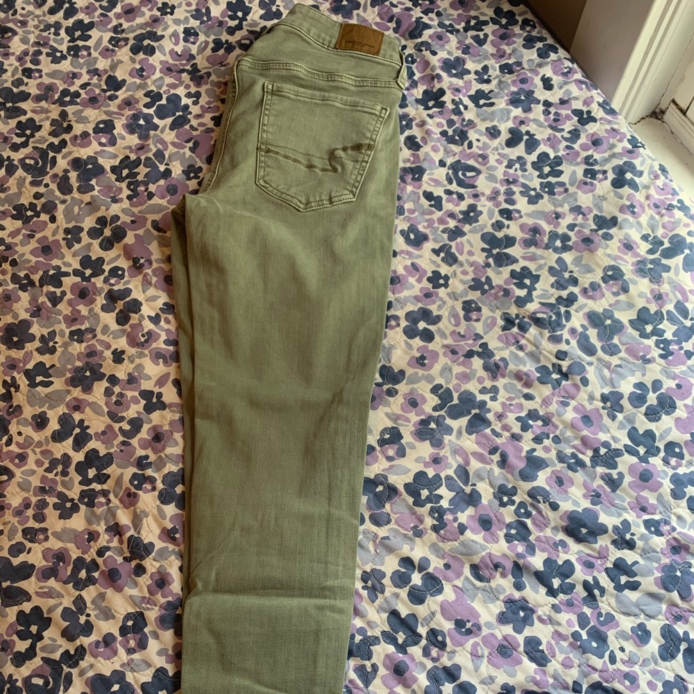 light green AE skinny jeans